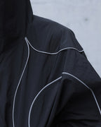 NICHE REFLECTIVE HOODIED WINDBREAKER