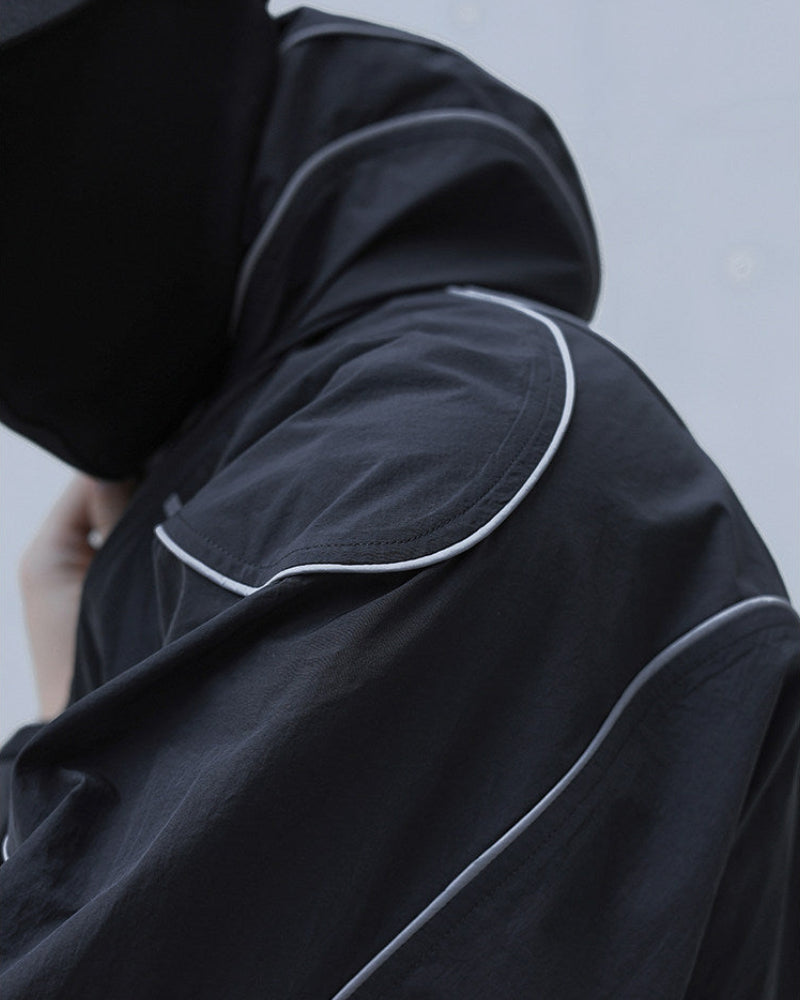 NICHE REFLECTIVE HOODIED WINDBREAKER