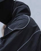 NICHE REFLECTIVE HOODIED WINDBREAKER