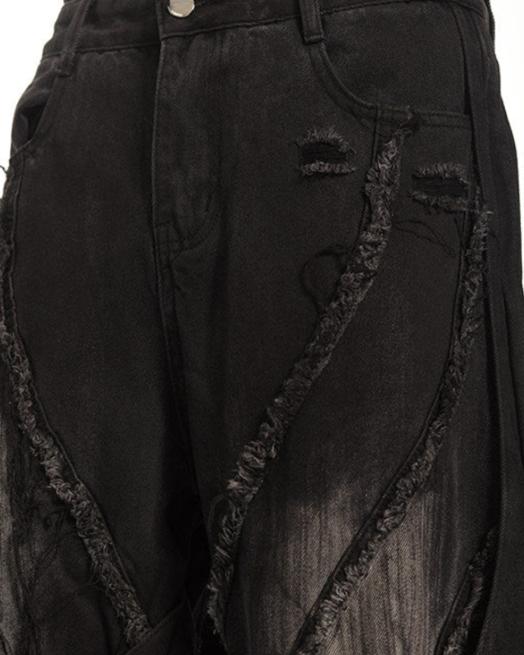 DECONSTRUCTED WIDE FLARE JEANS
