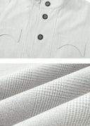CHAQUETA CON CINTURÓN Y ESTAMPADO TIPO CALEIDOSCOPIO OPENFLY