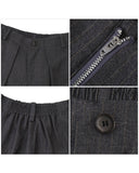 STRIPED PLEATED WIDE TROUSERS