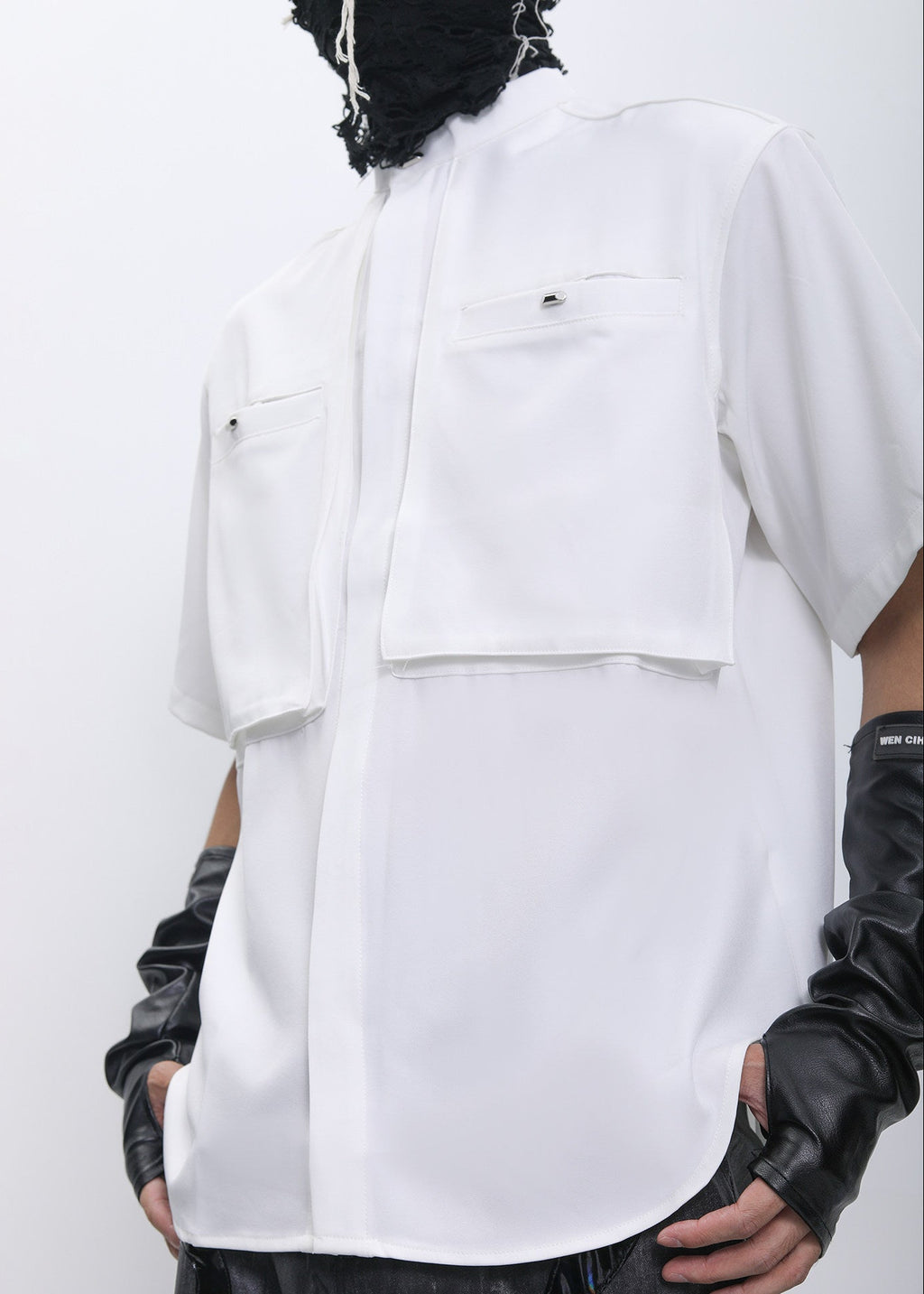 CAMISA MANSON OSCURA EN CAPAS