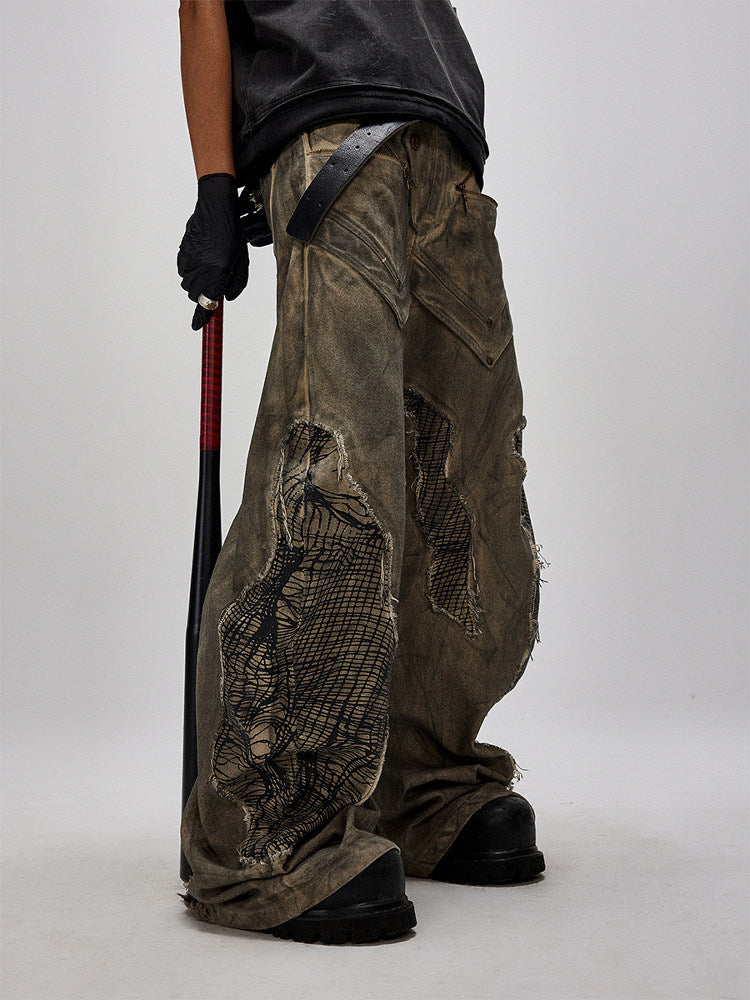 DUST THEORY mud-washed deconstructed curved-leg pants with mesh panels