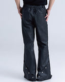WAXED DARK FLARE TROUSERS