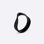 Amos Stainless Steel Ring black twisted band with precision edge detailing on white background