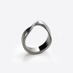 Amos Stainless Steel Ring with twisting band and precision edge detailing