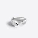 Sterling silver Amos Ring with a minimal twisted band and polished finish against a white background