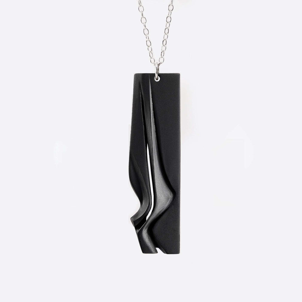 Nocturne Steel Pendant gray steel necklace with twisting stacking curves in modern design