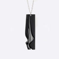 Nocturne Steel Pendant gray steel necklace with twisting stacking curves in modern design